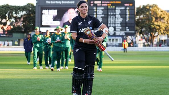 Amelia Kerr leaves the field after winning game