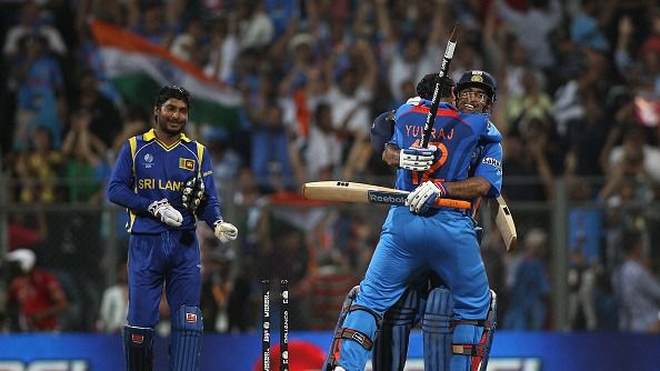 MS Dhoni  of India celebrates with Yuvraj Singh