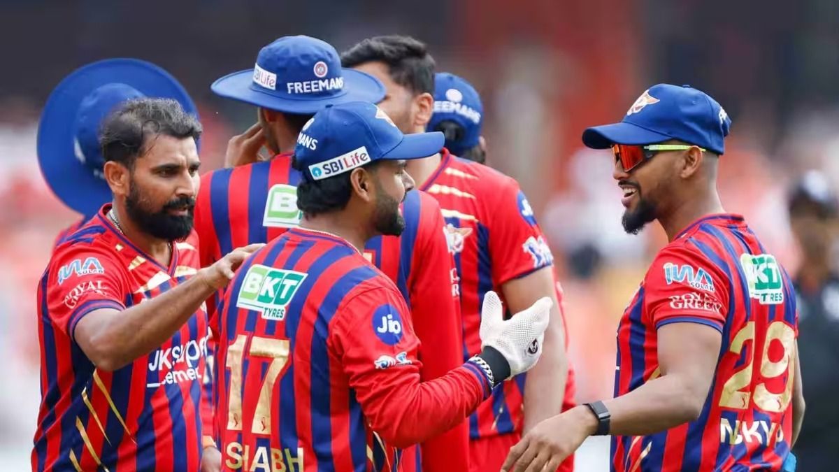 Shami with the players after taking a wicket