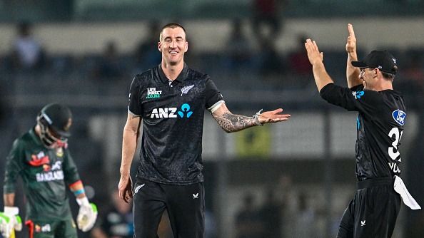 Blair Tickner (C) celebrates with teammates after taking the wicket of Bangladesh's captain Mehidy Hasan Miraz