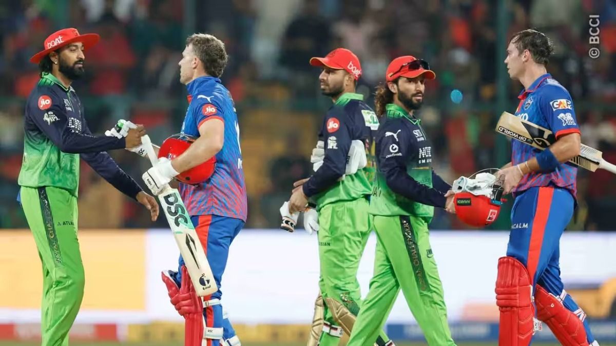 Rajat Patidar shaking hands with a player