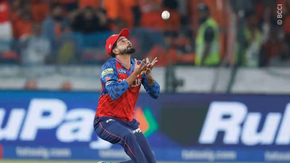 Punjab captain Shreyas Iyer takes a catch.