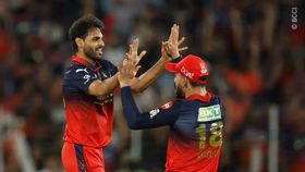 Bhuvneshwar Kumar and Virat Kohli Bhuvneshwar Kumar and Virat Kohli