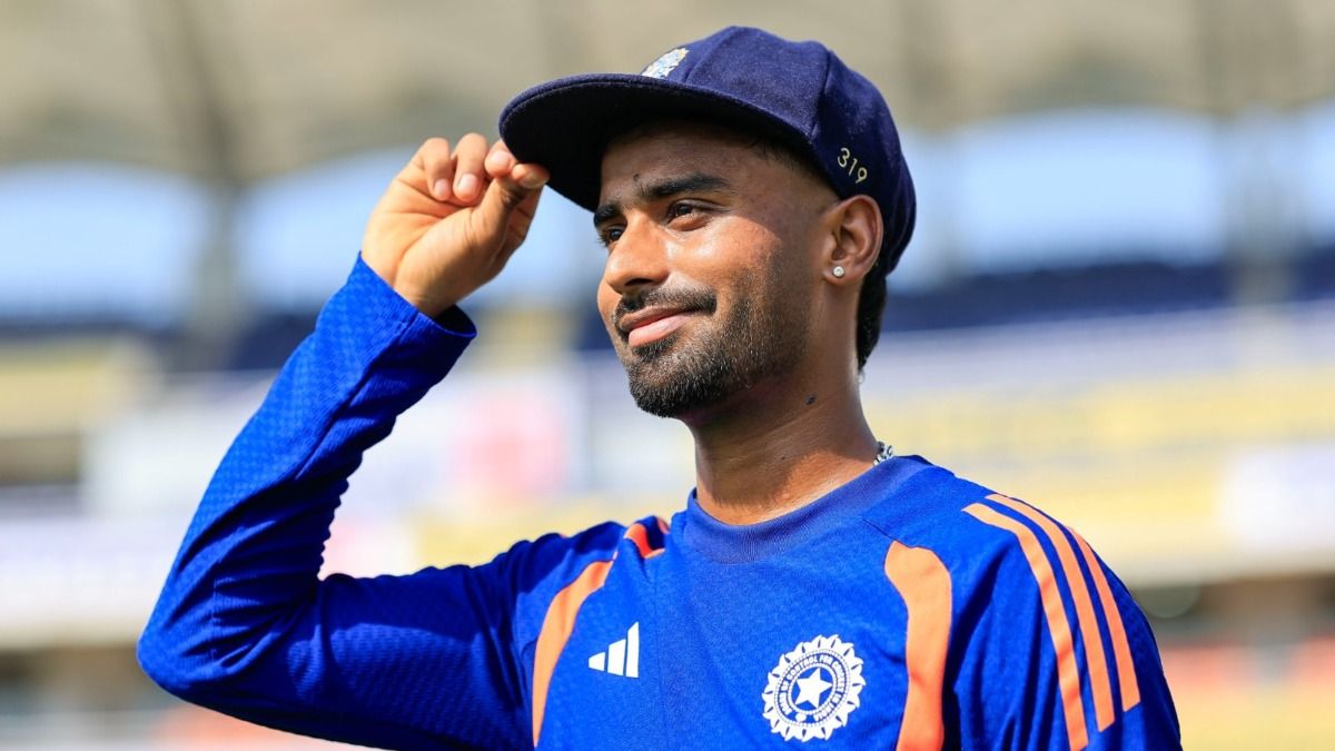 Manav Suthar after wearing his Test cap