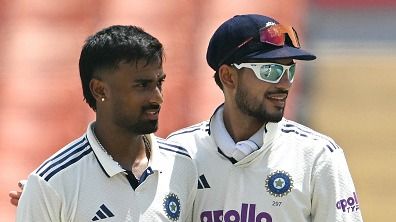 Manav Suthar (L) is congratulated by captain Shubhman Gill (R) Manav Suthar (L) is congratulated by captain Shubhman Gill (R)