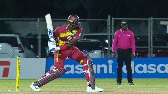 Jason Holder plays a shot during the match Jason Holder plays a shot during the match