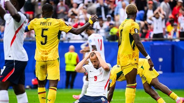 Harry Kane (England) looks disappointed