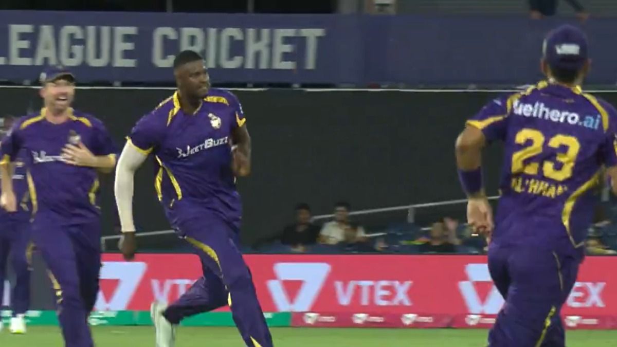 Jason Holder runs after taking a wicket Jason Holder runs after taking a wicket