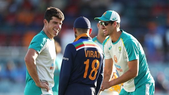 Henriques and Mitchell Starc with Virat Kohli