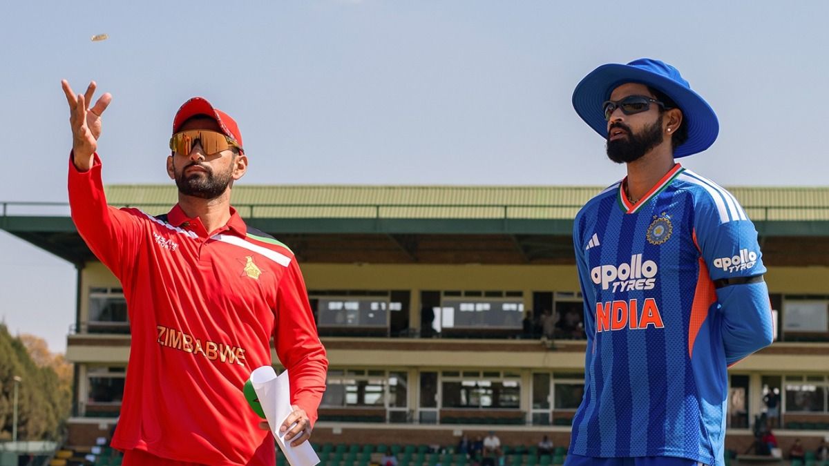Shreyas Iyer wearing a black armband during the toss