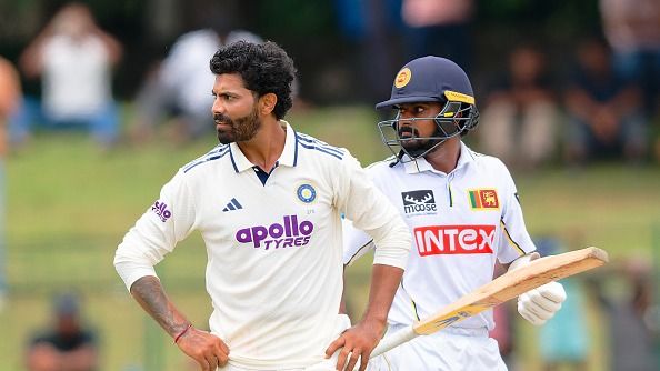Ravindra Jadeja (L) of India 