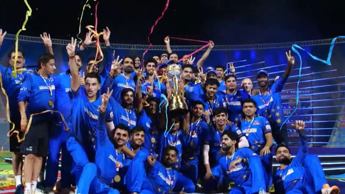 UP T20 League players with the trophy UP T20 League players with the trophy