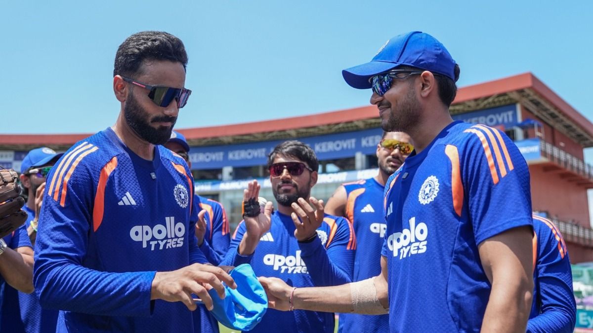 Shubman Gill presenting his debut cap to Naman Dheer
