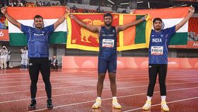 Gold medalist Sri Lanka's Rumesh Pathirage (C), silver medalist India's Yashvir Singh (L) and his compatriot bronze medalist Rohit Yadav Gold medalist Sri Lanka's Rumesh Pathirage (C), silver medalist India's Yashvir Singh (L) and his compatriot bronze medalist Rohit Yadav