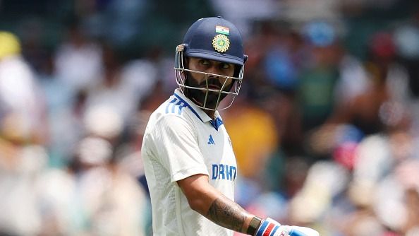 Virat Kohli of India looks dejected while leaving the field after being dismissed by Scott Boland