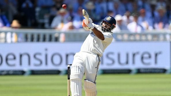 Rishabh Pant of India hits out for six runs from the bowling of Ben Stokes of England