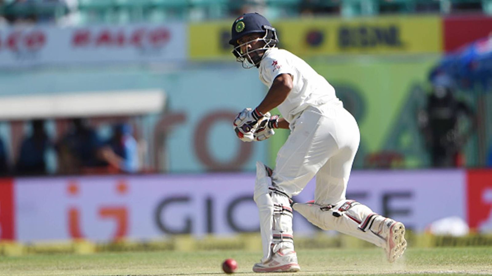 Despite a stiff neck, Wriddhiman Saha scores half-century after 1579 days Despite a stiff neck, Wriddhiman Saha scores half-century after 1579 days