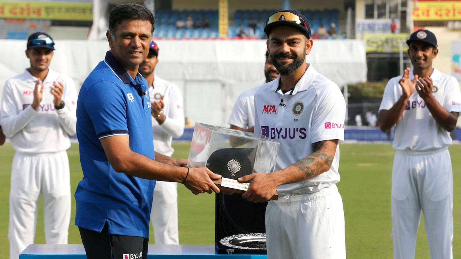 Virat felicitated by childhood hero Dravid in presence of wife Anushka on remarkable 100th Test Virat felicitated by childhood hero Dravid in presence of wife Anushka on remarkable 100th Test