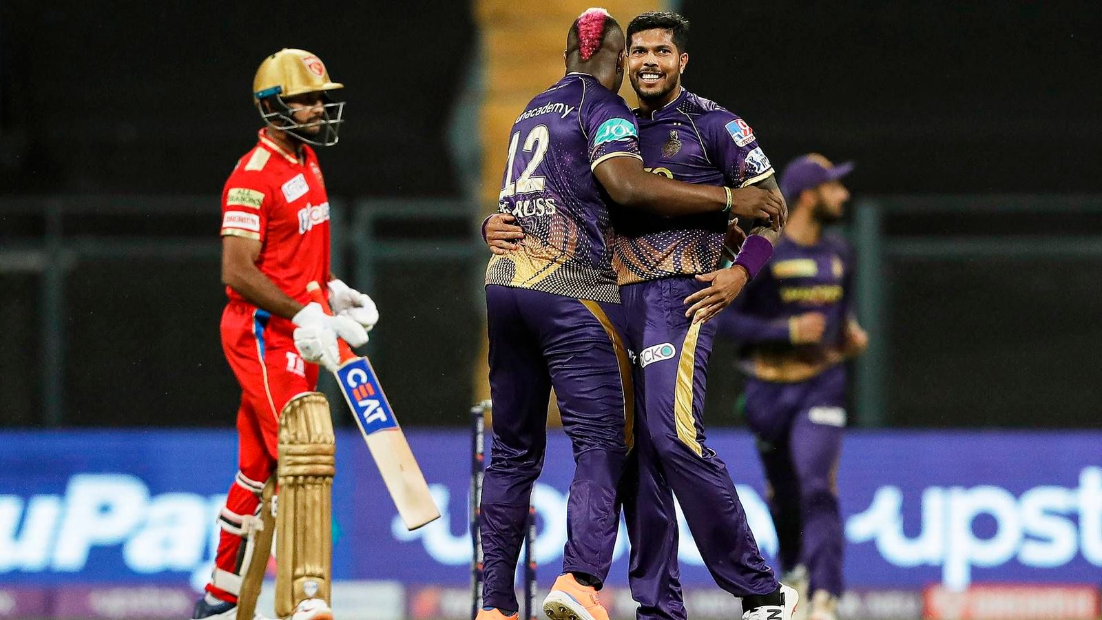 Russell's maniac hitting, Umesh's demolishing spell help KKR bulldoze PBKS to reach top of points table Russell's maniac hitting, Umesh's demolishing spell help KKR bulldoze PBKS to reach top of points table