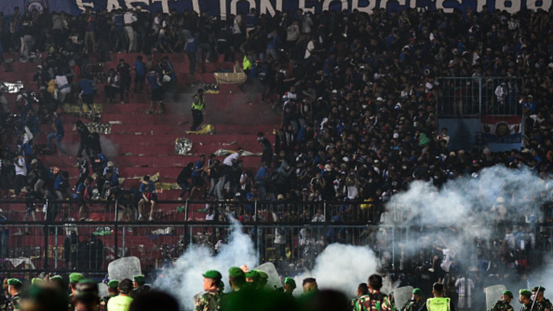 Football match in Indonesia turns violent as fans storm the pitch: Over 175 people feared dead and many more injured Football match in Indonesia turns violent as fans storm the pitch: Over 175 people feared dead and many more injured