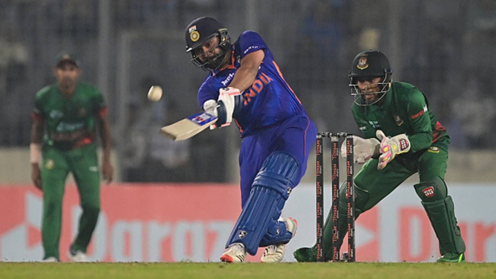 Wounded Rohit's ultra-aggressive knock goes in vain as Mustafizur helps Bangladesh win by 5 runs, take unassailable 2-0 lead Wounded Rohit's ultra-aggressive knock goes in vain as Mustafizur helps Bangladesh win by 5 runs, take unassailable 2-0 lead