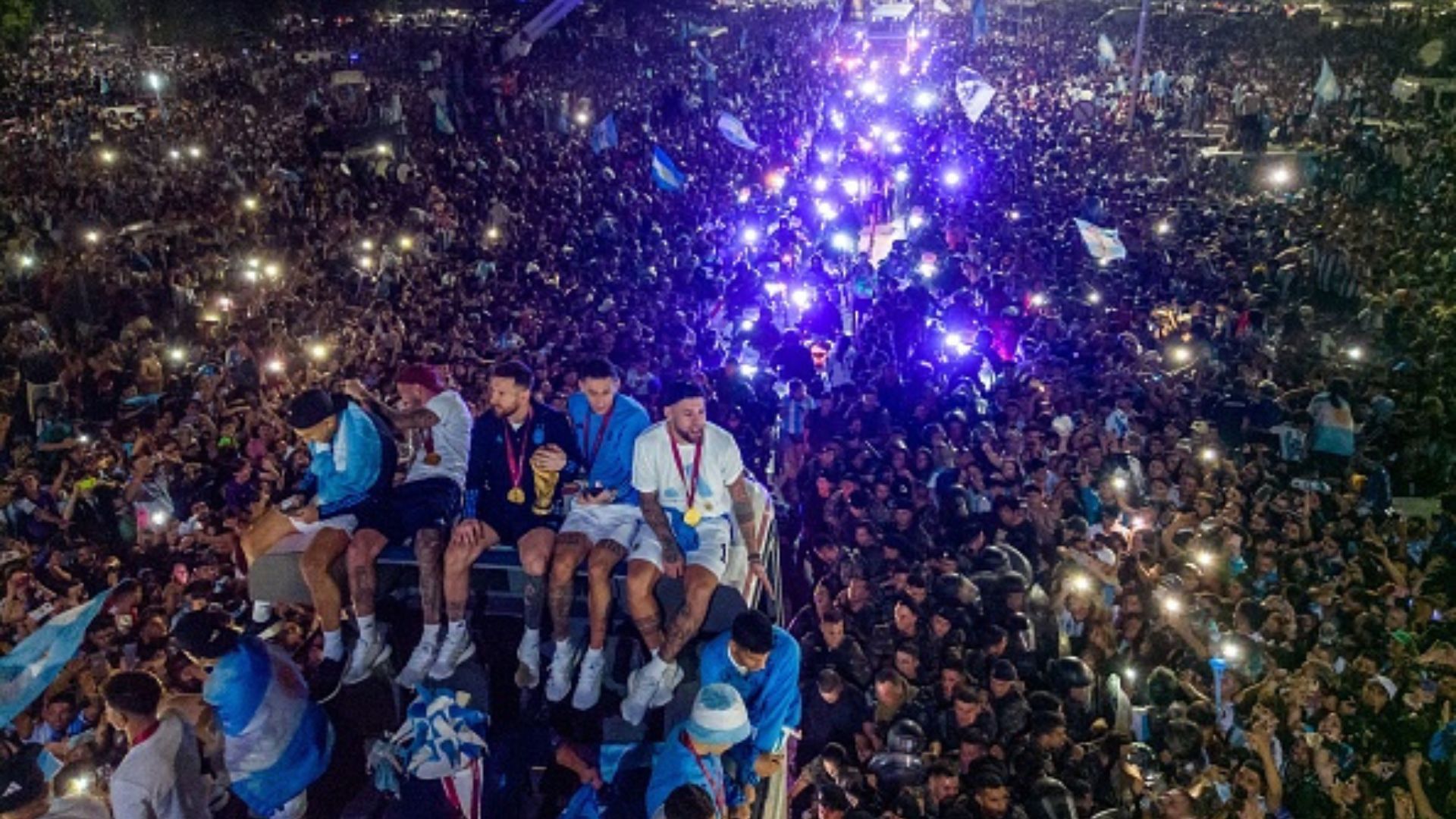 Thousands of Argentina fans throng Buenos Aires airport as Lionel Messi and co. land with World Cup trophy Thousands of Argentina fans throng Buenos Aires airport as Lionel Messi and co. land with World Cup trophy