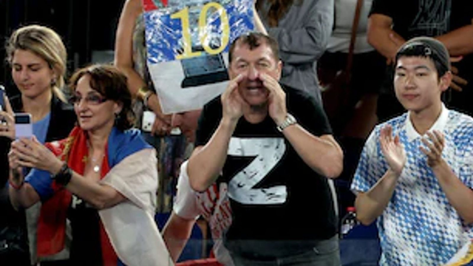 Australian Open: Novak Djokovic's father pictured with pro-Putin protesters as tournament chiefs react Australian Open: Novak Djokovic's father pictured with pro-Putin protesters as tournament chiefs react