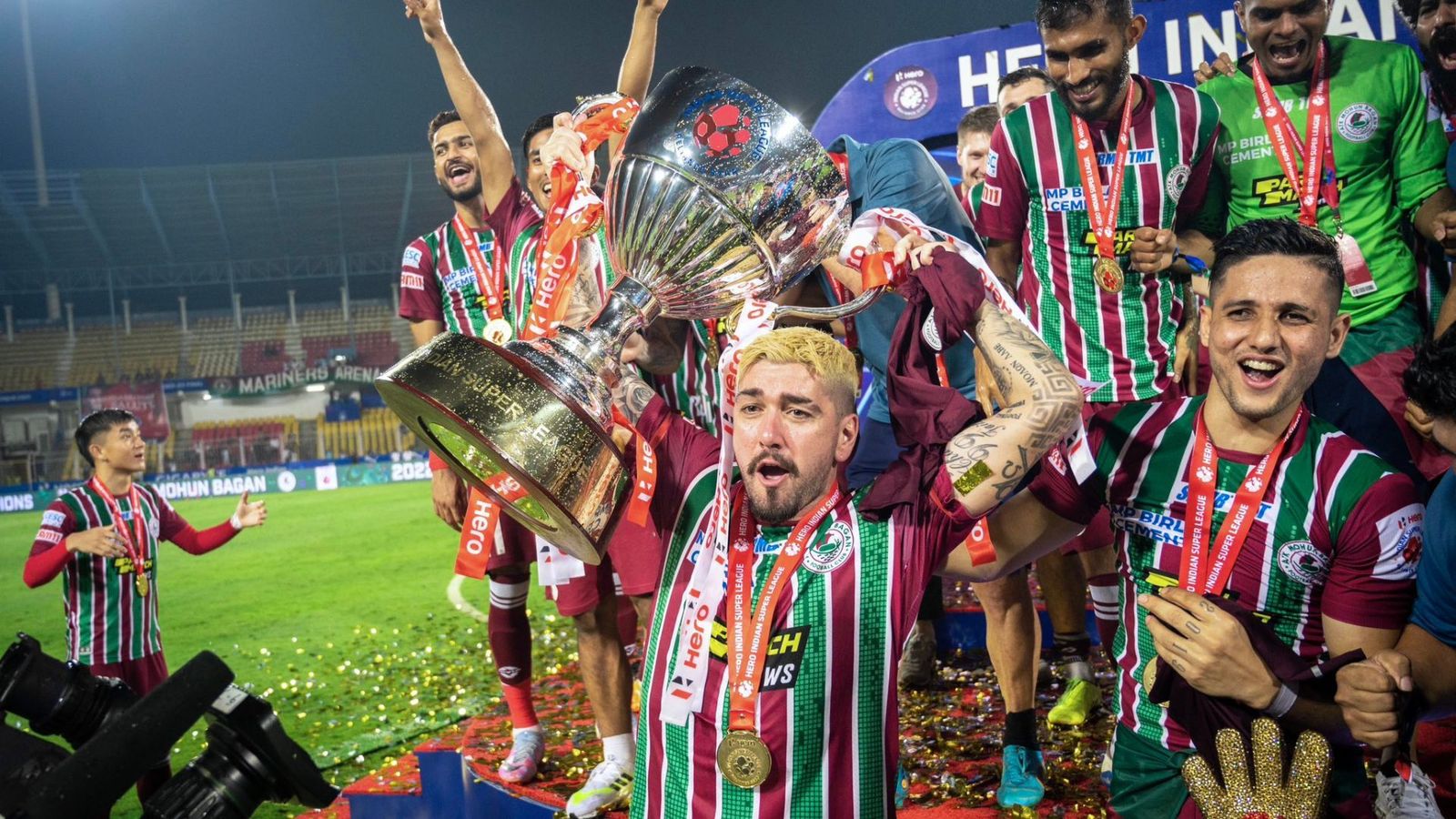 WATCH: ATK Mohun Bagan fans go wild, crowd airport after team returns with first trophy and a new name WATCH: ATK Mohun Bagan fans go wild, crowd airport after team returns with first trophy and a new name