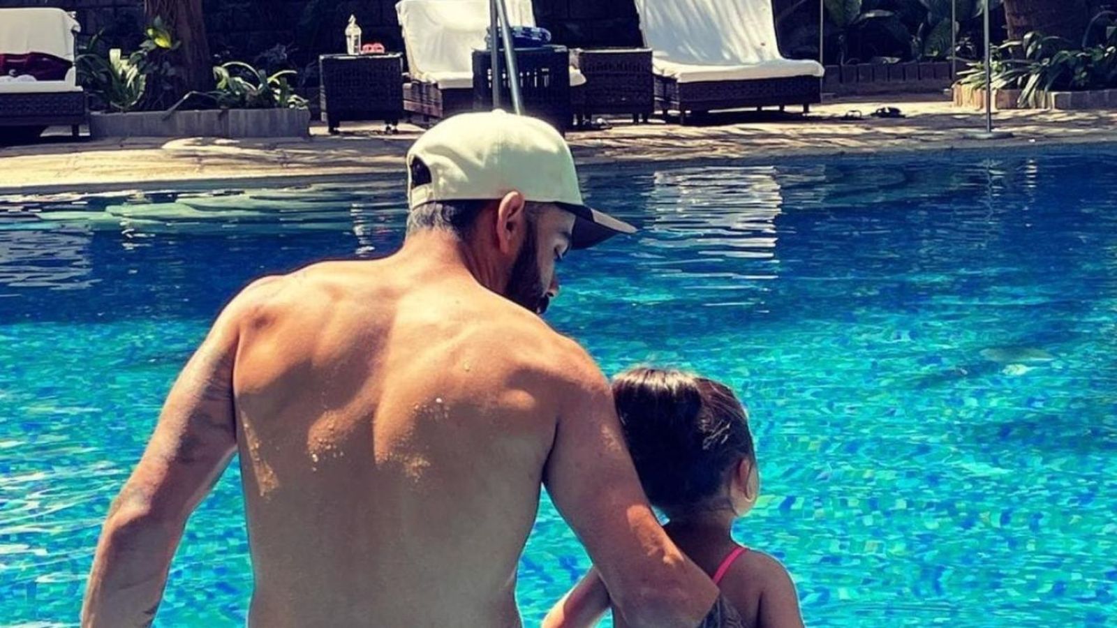 Virat Kohli and daughter Vamika melt hearts with lovable photo of them chilling poolside: See here Virat Kohli and daughter Vamika melt hearts with lovable photo of them chilling poolside: See here