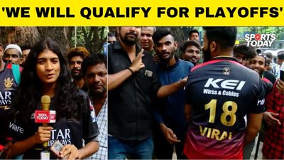 RCB fans excited for the game despite the rain scare in Bangalore SportsTak