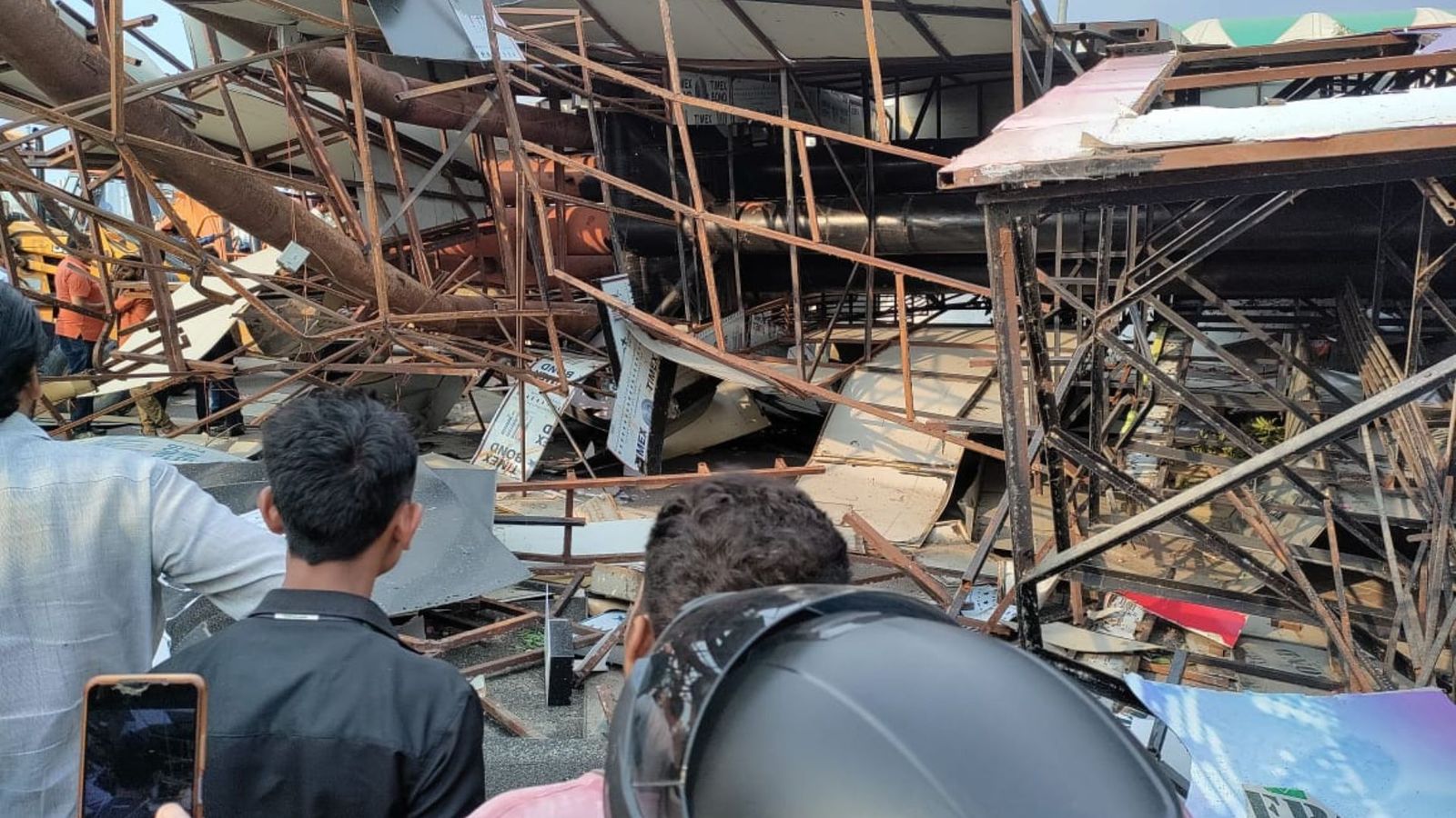 Two women lose life after billboard falls on car outside LSG's home ground Two women lose life after billboard falls on car outside LSG's home ground