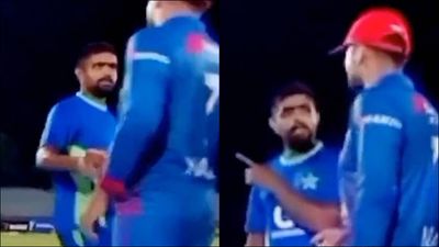 Watch: Babar Azam loses his cool after thrilling one-wicket win, has heated encounter with Mohammad Nabi SportsTak