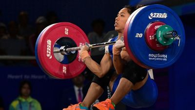 'It was my dream to win a medal in the Asian Games but it's not happening': Emotional Mirabai Chanu after finishing 4th India's Saikhom Mirabai Chanu competes in the women's 49kg weightlifting competition during the 2022 Asian Games in Hangzhou, in China's eastern Zhejiang province on September 30, 2023.