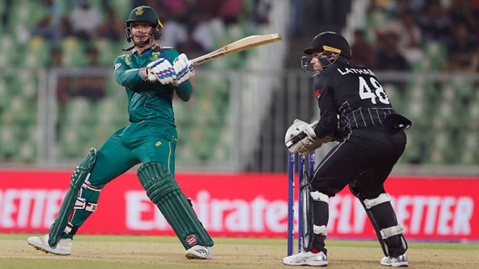 Quinton de Kock's unbeaten 84 in vain as New Zealand register 7-run win by DLS method in rain-marred high-scoring affair Quinton de Kock's unbeaten 84 in vain as New Zealand register 7-run win by DLS method in rain-marred high-scoring affair