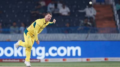 Warner bowls in One-Day cricket after 12 years, almost gets Iftikhar's wicket but ends up leaking 41 runs from 2 overs David Warner bowls during warm-up clash against Pakistan (Getty Images)