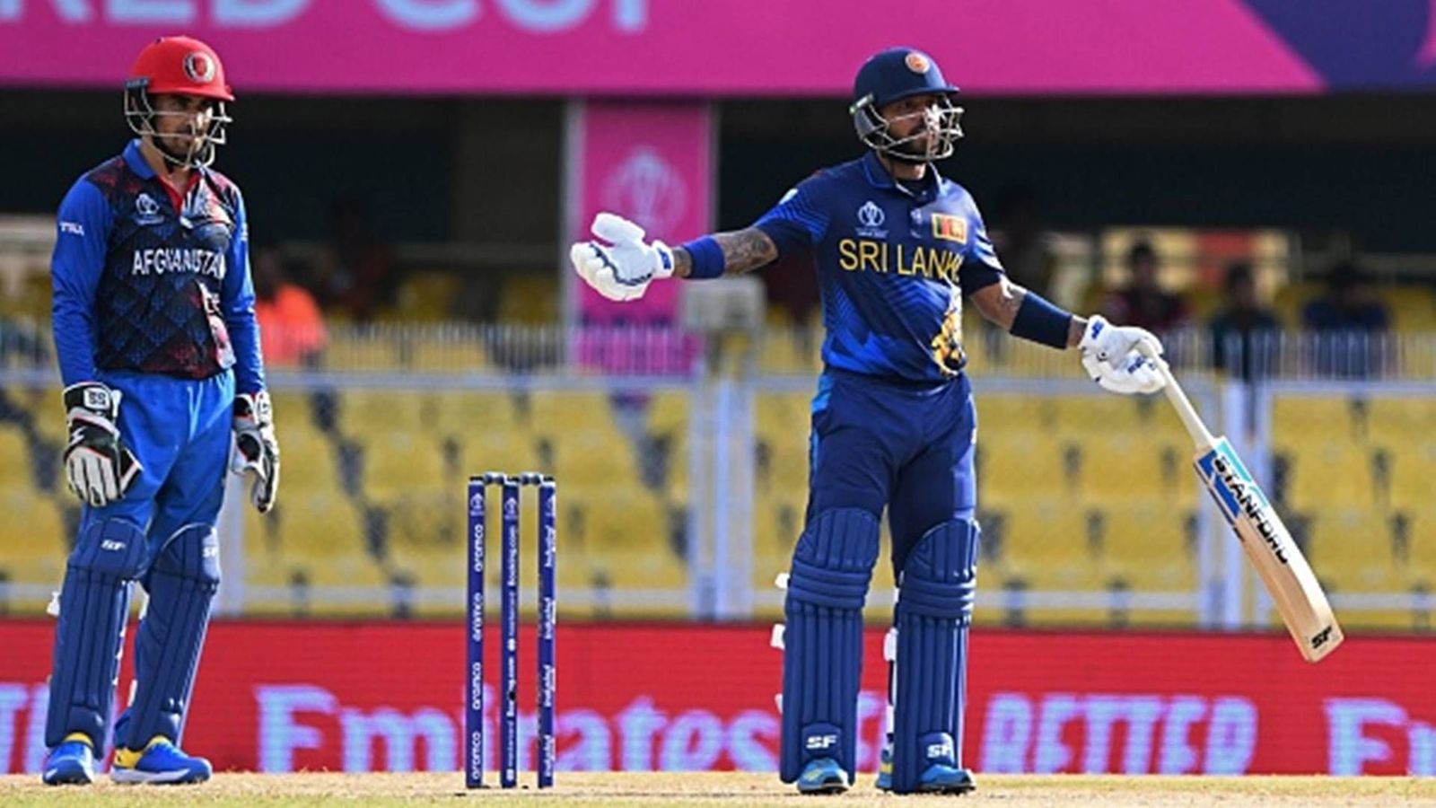 Mendis' ballistic 87-ball 158 overpowered by Gurbaz's 119, Rahmat's 93 as Afghanistan win rain-marred game by 6 wickets Kusal Mendis (R) reacts during a warm-up match between Afghanistan and Sri Lanka (Getty Images)