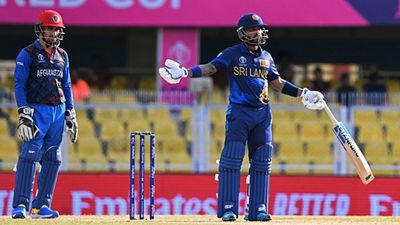 Mendis' ballistic 87-ball 158 overpowered by Gurbaz's 119, Rahmat's 93 as Afghanistan win rain-marred game by 6 wickets Kusal Mendis (R) reacts during a warm-up match between Afghanistan and Sri Lanka (Getty Images)
