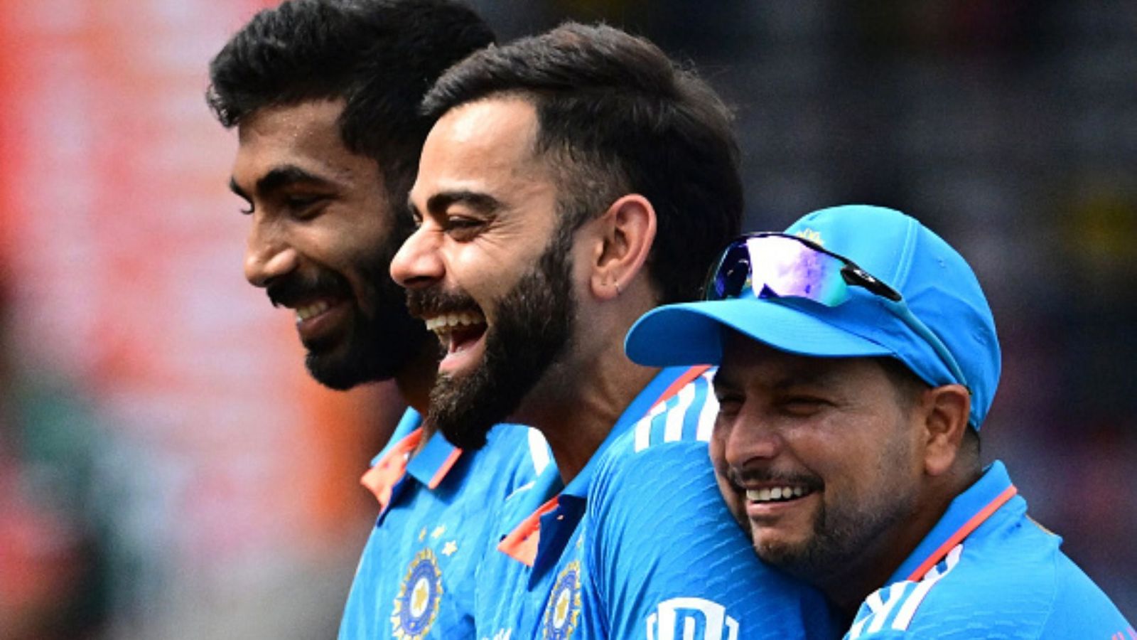 Two-time World Cup winner surprisingly snubs Kuldeep Yadav from India's ideal playing XI while revealing team's best five bowling options India's Virat Kohli (C), Jasprit Bumrah (L) and Kuldeep Yadav gesture before the start of the Asia Cup 2023 Super Four one-day international (ODI) cricket match between India and Bangladesh at the R. Premadasa Stadium in Colombo on September 15, 2023.