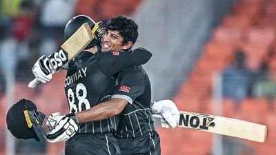 Record-breakers Conway, Ravindra teach England a lesson in ‘Bazball’ to avenge World Cup final defeat with 9-wicket win in opener Rachin Ravindra hugs Devon Conway after reaching his century (Getty Images)