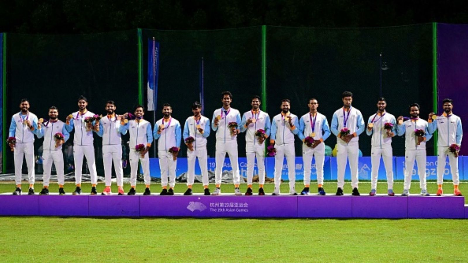 'Asian Games Gold should have been shared...': Afghan pacer Fareed Malik, travelling with squad for ODI World Cup, makes controversial statement India's players pose with their gold medals in the men's cricket award ceremony during the Hangzhou 2022 Asian Games in Hangzhou, in China's eastern Zhejiang province on October 7, 2023.