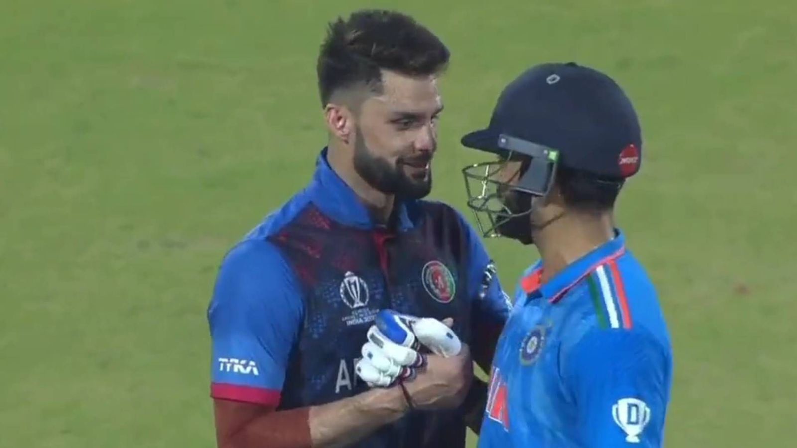 Virat Kohli and Naveen-ul-Haq bury the hatchet five months after ugly verbal spat in IPL 2023, watch viral video of the month Virat Kohli and Naveen-ul-Haq (Screengrab: Hotstar)