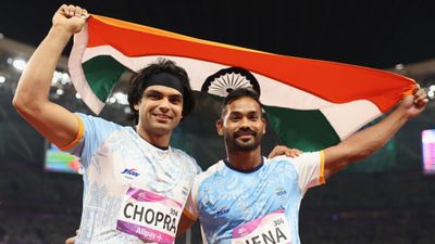 Exclusive: 'Jena's throw helped me push myself:' Neeraj Chopra explains how he fought 'technical glitch' setback to defend Asian Games gold (L-R) Silver medalist Kishore Kumar Jena of India, gold medalist Neeraj Chopra of India celebrate after competes in the men's javelin throw final athletics event during the 2022 Asian Games at Hangzhou Olympic Sports Centre on October 04, 2023 in