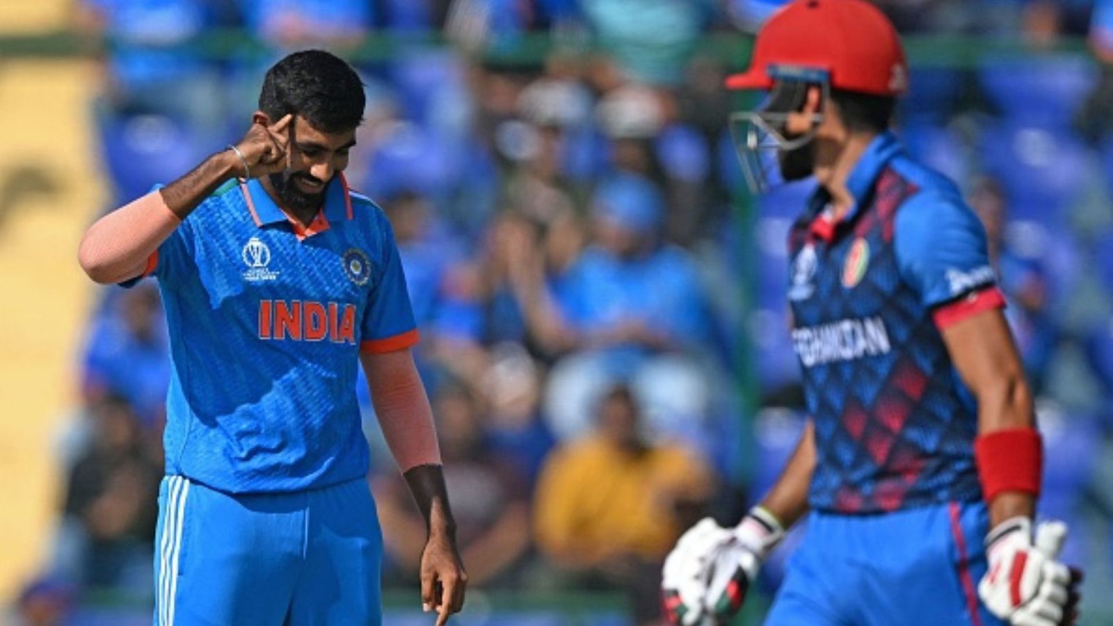 Mother comes first, Pakistan secondary: Returning for first-ever ODI appearance in Ahmedabad, Jasprit Bumrah has priorities set India's Jasprit Bumrah celebrates after taking the wicket of Afghanistan's Ibrahim Zadran (R) during the 2023 ICC Men's Cricket World Cup one-day international (ODI) match between India and Afghanistan at the Arun Jaitley Stadium in New Delhi on October