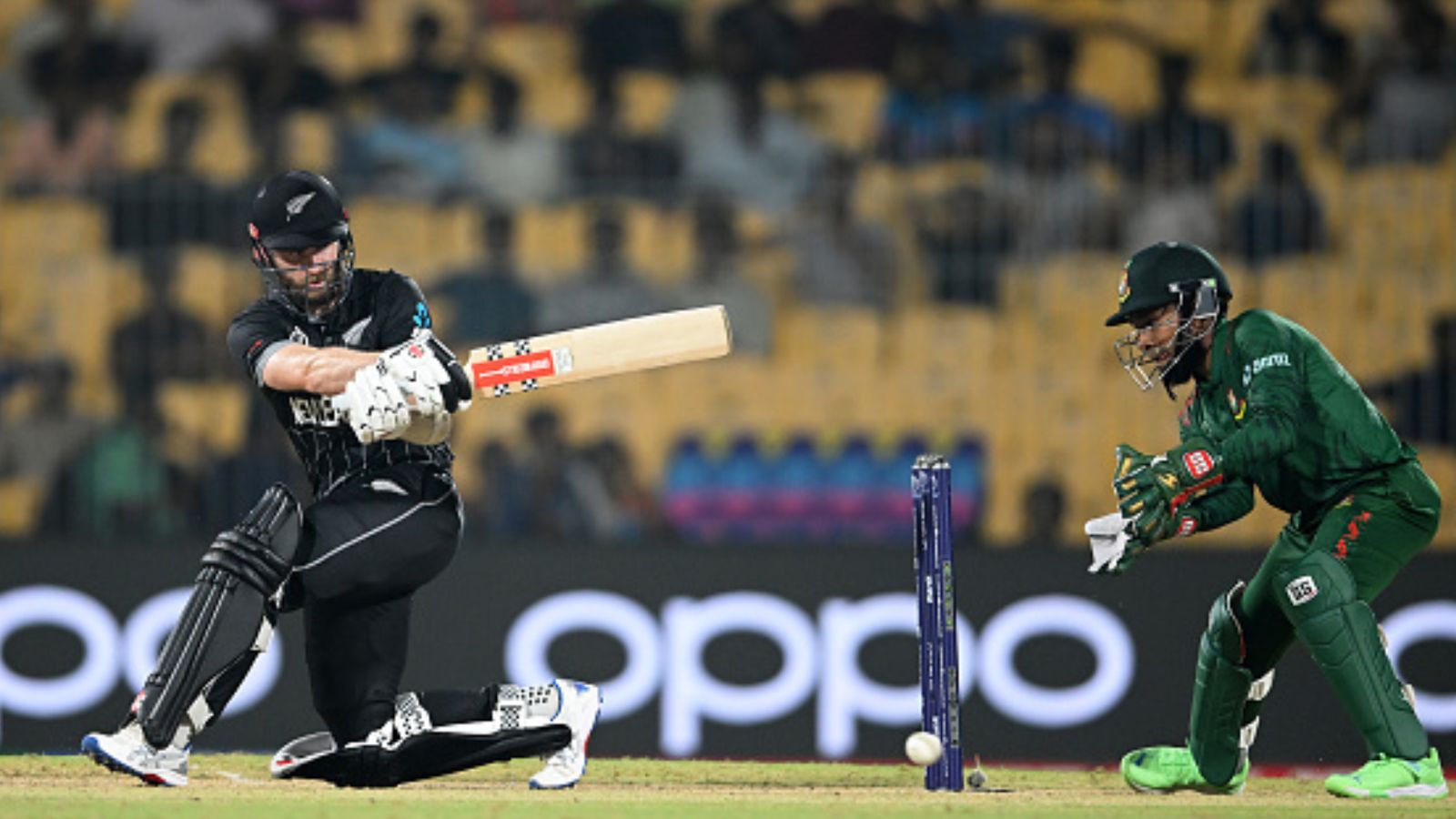 NZ vs BAN: Williamson's robust comeback leads New Zealand to hat-trick win, thrash Bangladesh by eight wickets Kane Williamson of New Zealand plays a shot as Mushfiqur Rahi of Bangladesh keeps during the ICC Men's Cricket World Cup India 2023 between New Zealand and Bangladesh at MA Chidambaram Stadium on October 13, 2023 in Chennai, India.