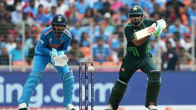 IND vs PAK: Babar Azam cracks 1st ever half-century against India in ODI World Cup history before being bowled by Siraj Babar Azam of Pakistan bats during the ICC Men's Cricket World Cup India 2023 between India and Pakistan at Narendra Modi Stadium on October 14, 2023 in Ahmedabad, India.