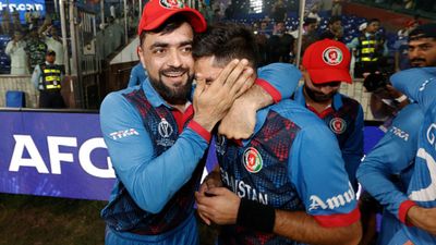 AFG vs ENG: Cricket greats salute Afghanistan after minnows pull off 'biggest upset in World Cup history' against England Rashid Khan of Afghanistan celebrates the wicket of Mark Wood of England to win by 69 runs during the ICC Men's Cricket World Cup India 2023 between England and Afghanistan.