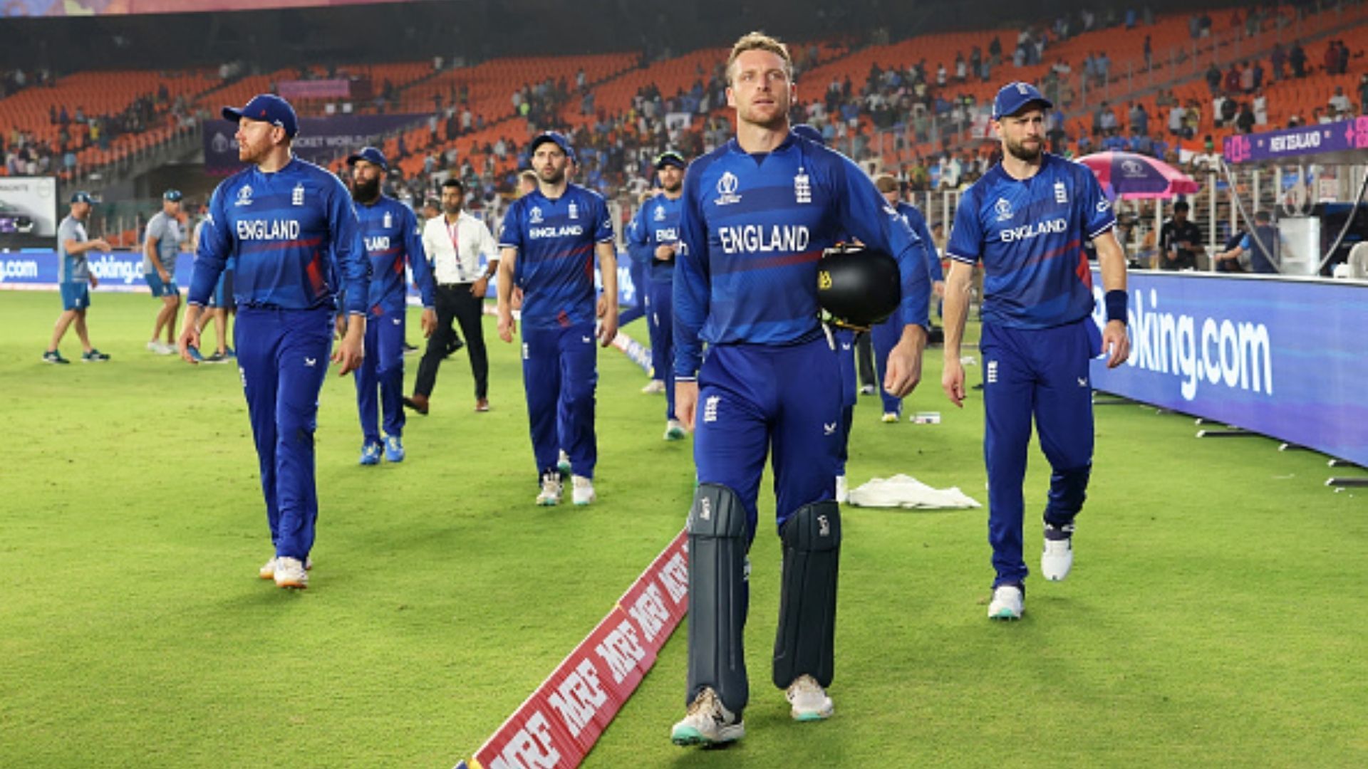 More disappointment for England after shock loss to Afghanistan, World Cup defending champions become first team to achieve unwanted feat Jos Buttler of England cuts a dejected figure during the ODI World Cup match between England and New Zealand