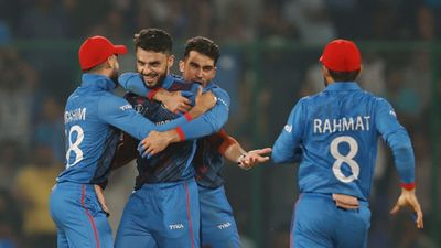 ODI World Cup 2023: Afghanistan's shock win over England puts Australia, Pakistan in turmoil for semi-final spot Naveen ul Haq of Afghanistan celebrates the wicket of Jos Buttler of England during the ODI World Cup match between England and Afghanistan