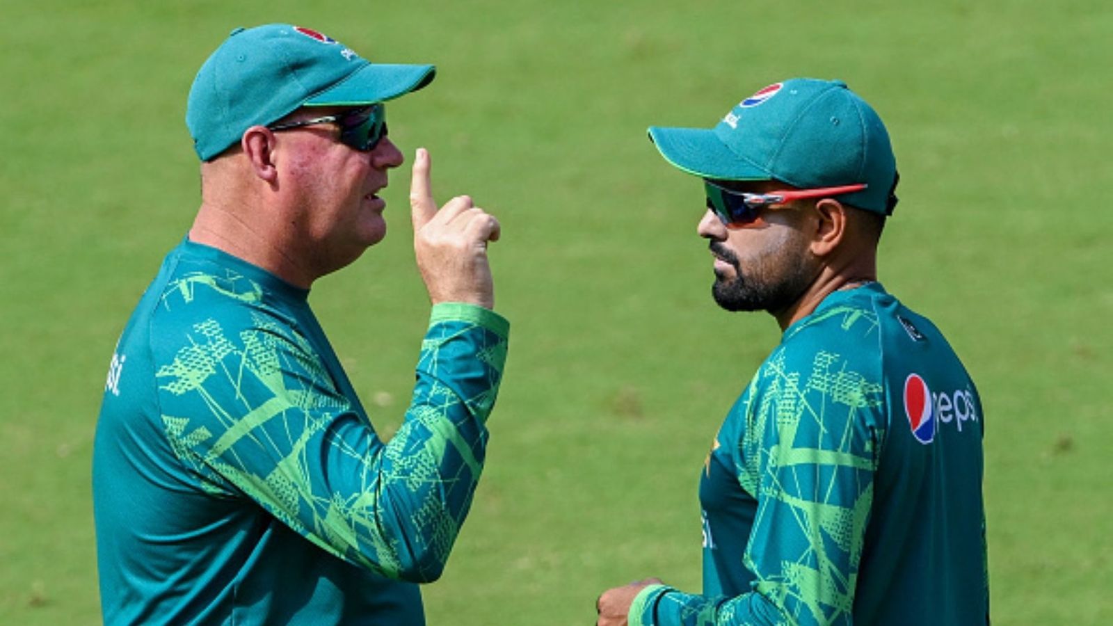 'Even our C team can beat Pakistan’s main XI': 2-time World Cup winner rips Mickey Arthur for dreaming World Cup final clash between arch-rivals Mickey Arthur (L) and Babar Azam (R).