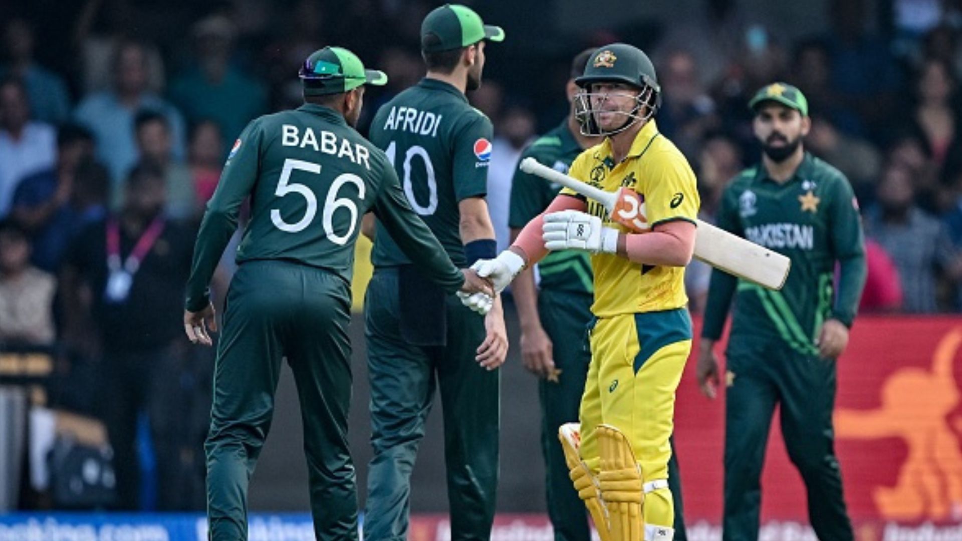 David Warner adds insult to Pakistan's injury after wounding them with 163-run knock, says 'it's their bowling that'd hurt more' Australia's David Warner (C, right) is being greeted by Pakistan's captain Babar Azam (L) after his dismissal during the 2023 ICC Men's Cricket World Cup one-day international (ODI) match between Australia and Pakistan at the M. Chinnaswamy Stadium in